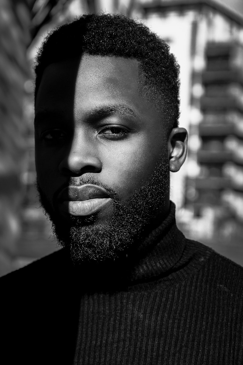 man in black turtleneck sweater